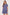 Woman wearing a blue patterned pajama set against a white background