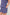 Navy blue pajama set with white floral pattern on a plain background