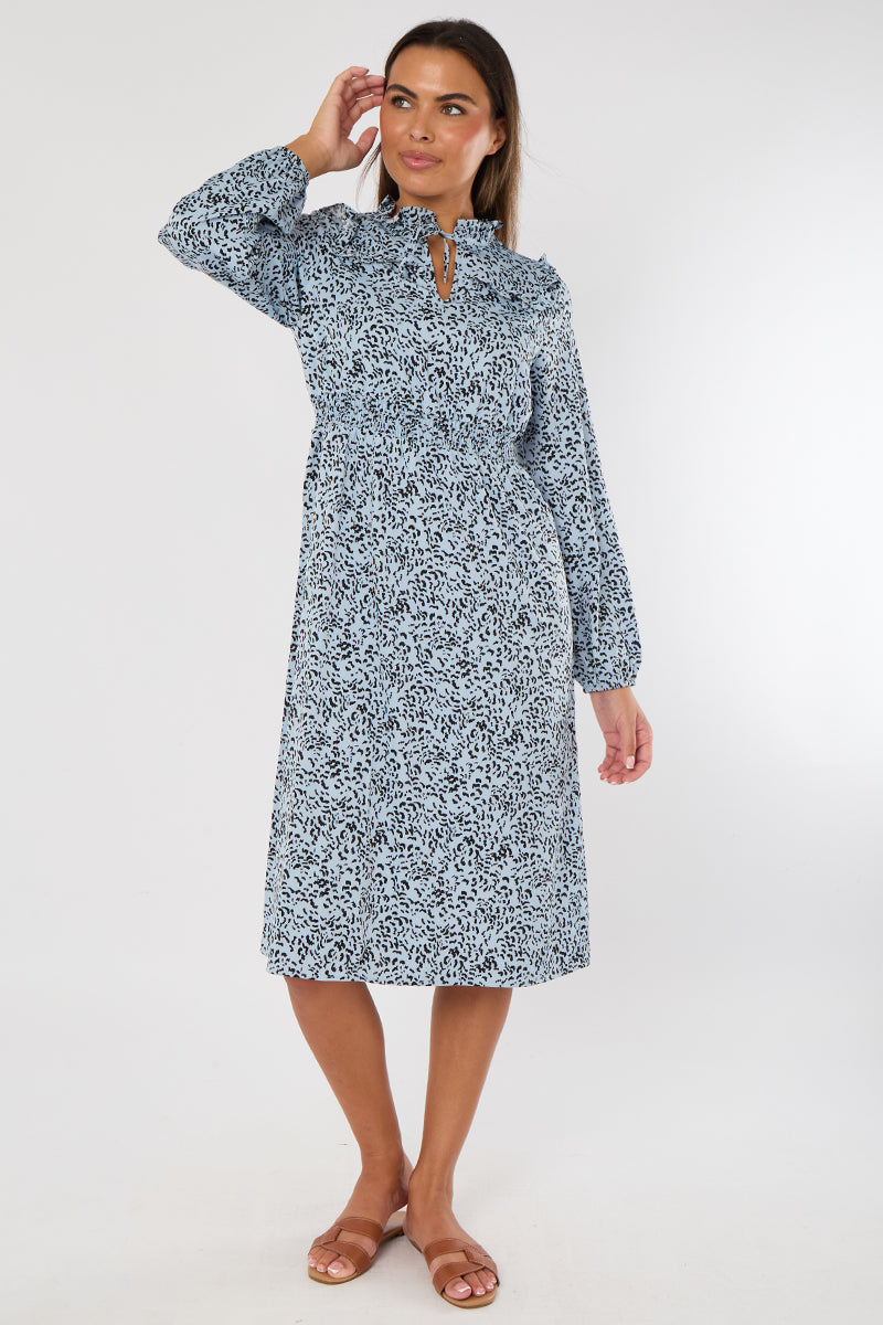 Woman wearing a floral dress on a white background
