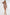Woman wearing a bronze sequin dress on a white background