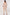 women’s knitted co-ord set UK, beige loungewear two piece, knitted joggers and jumper set, cosy knitted lounge set, casual women’s knitwear outfit, matching knitted set UK
