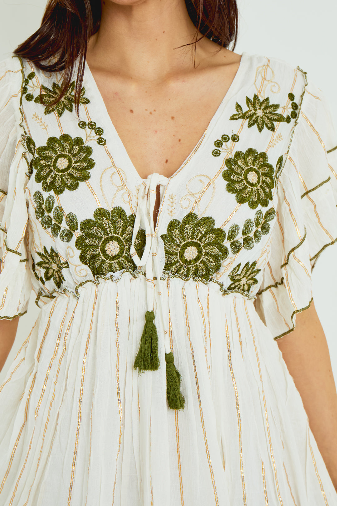 Women’s boho embroidered maxi dress with detailed embroidery, flutter sleeves and tassel tie neckline, made from 100% viscose.