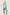 Women’s mint green satin short sleeve pajama set with button-up top and full-length pants, featuring black piping. Model is barefoot and relaxed, wearing lightweight 100% polyester sleepwear ideal for lounging and bedtime