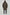 Person wearing a long puffer coat with a hood on a white background